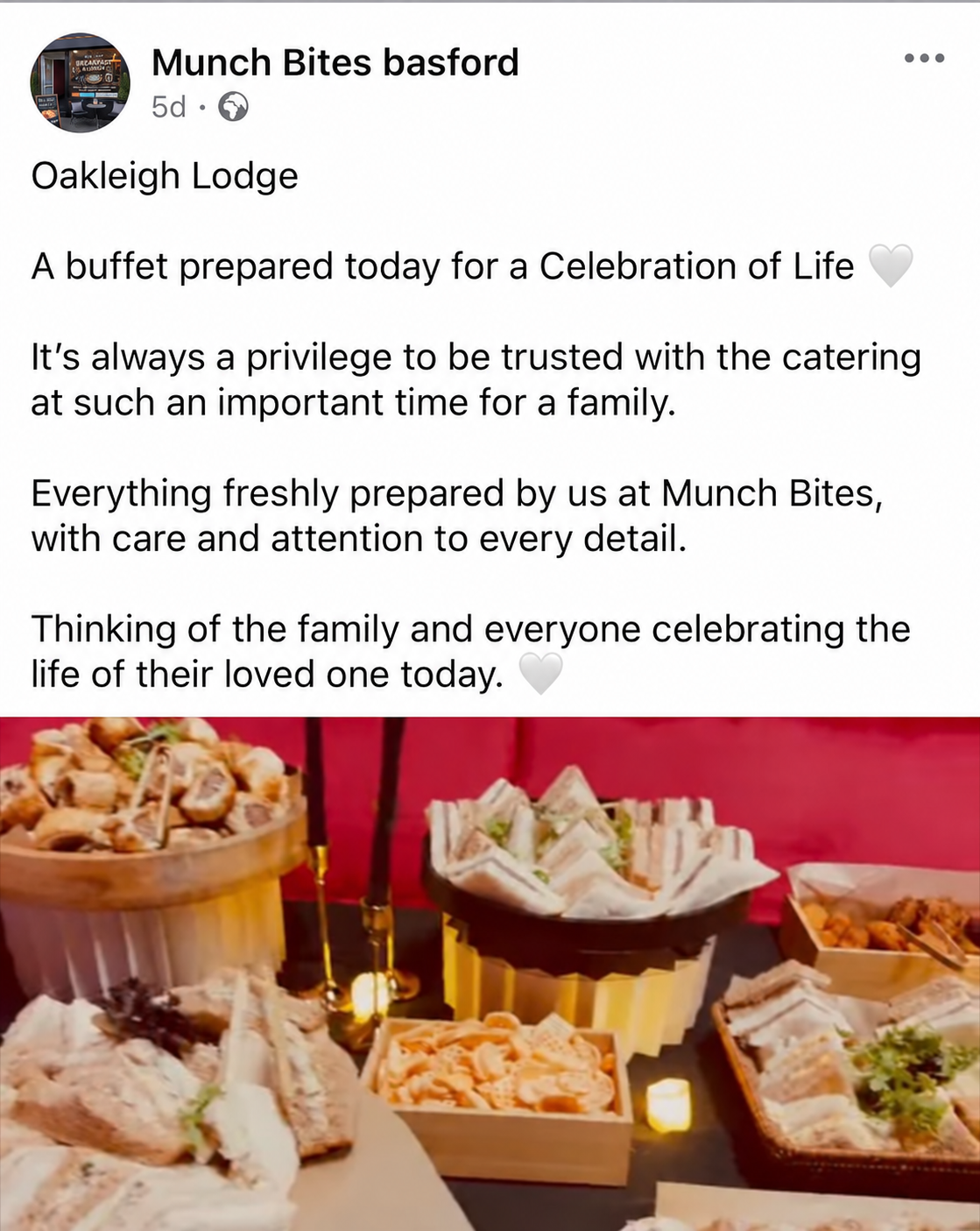Munch Bites buffet table with sandwich platters and savoury bites, shown in the café’s catering post