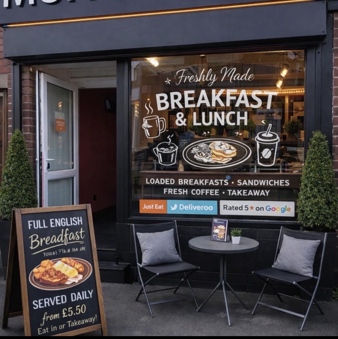 Munch Bites shopfront with breakfast and lunch signage and outdoor seating